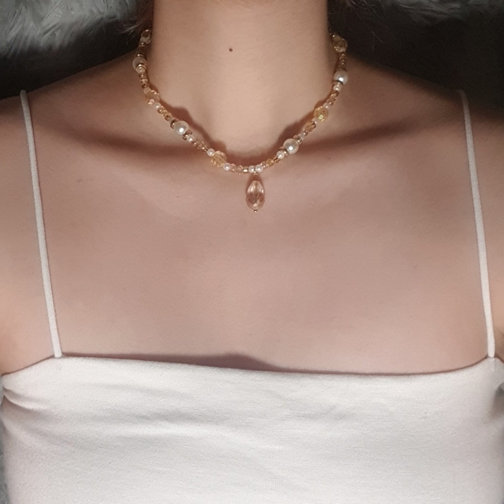 Handmade necklace original beaded design with multi faceted crystal drop centre